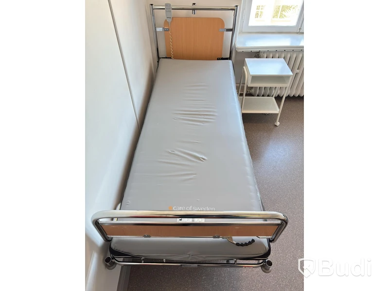Sjukhussäng, elektrisk, ställbar inkl. sidobord