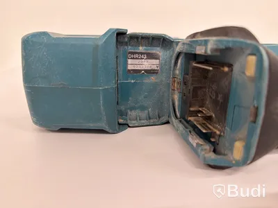 Batteriedriven borrhammare Makita DHR243, 18V, dammsamlare
