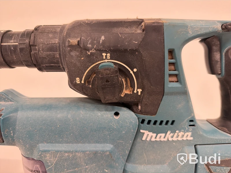 Batteriedriven borrhammare Makita DHR243, 18V, dammsamlare