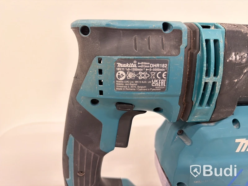 Batteridriven borrhammare Makita DHR182, 18V, Dammsamlare Makita DX05