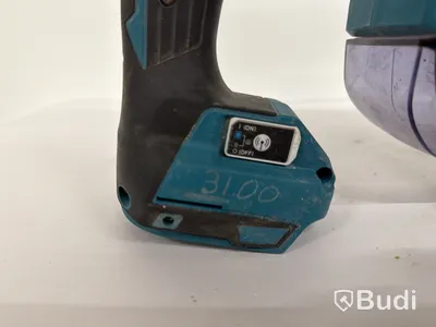 Batteridriven borrhammare Makita DHR182, 18V, Dammsamlare Makita DX05