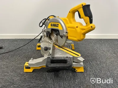 Kap-/gersåg Dewalt DWS777-QS med monteringsbyglar Dewalt DE7023-XJ