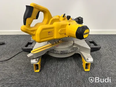 Kap-/gersåg Dewalt DWS777-QS med monteringsbyglar Dewalt DE7023-XJ