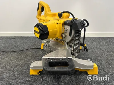 Kap-/gersåg Dewalt DWS777-QS med monteringsbyglar Dewalt DE7023-XJ