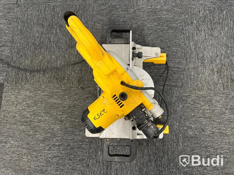 Kap-/gersåg Dewalt DWS777-QS med monteringsbyglar Dewalt DE7023-XJ
