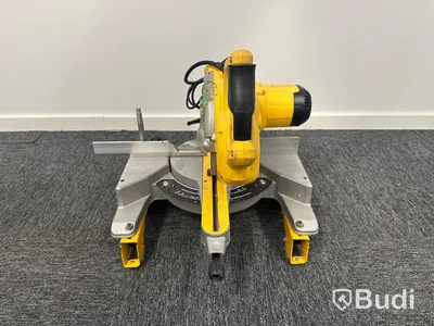 Kap-/gersåg Dewalt DWS777-QS med monteringsbyglar Dewalt DE7023-XJ