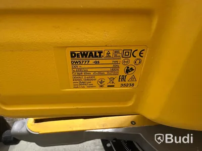 Kap-/gersåg Dewalt DWS777-QS med monteringsbyglar Dewalt DE7023-XJ