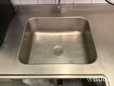 Rostfri arbetsbänk i hörnmodell med ho