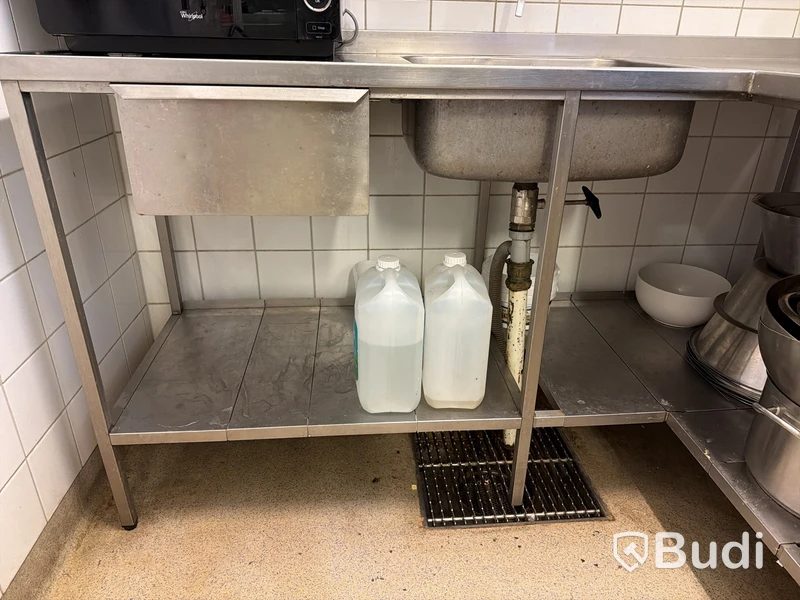 Rostfri arbetsbänk i hörnmodell med ho