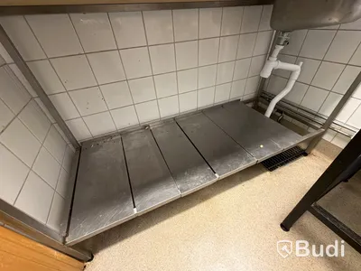 Rostfri arbetsbänk med ho