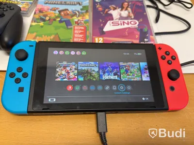 Spelkonsol Nintendo Switch, röd/blå Joy-Con