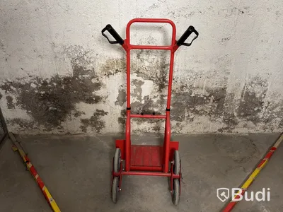 Stair-climbing hand truck, red-painted metal