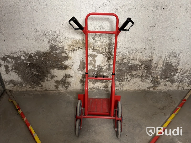 Stair-climbing hand truck, red-painted metal