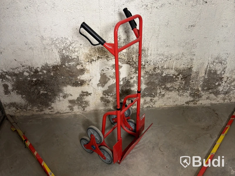 Stair-climbing hand truck, red-painted metal