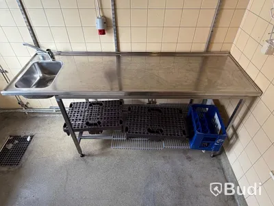 Rostfri arbetsbänk med ho