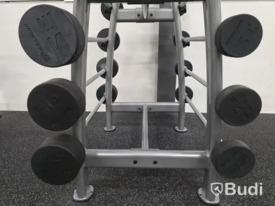 Skivstänger med fasta vikter 10-45kg.