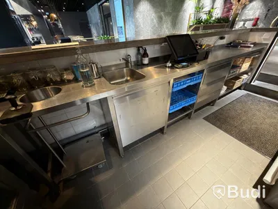 Stainless steel workbench with sink and drawers