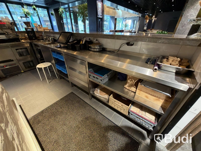 Stainless steel workbench with sink and drawers
