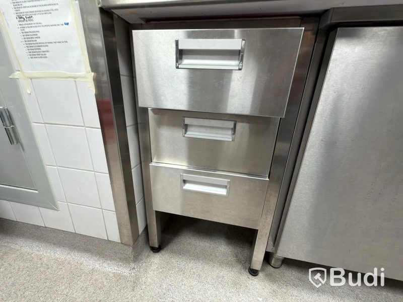 Rostfri skåp med 3 lådor och innehåll