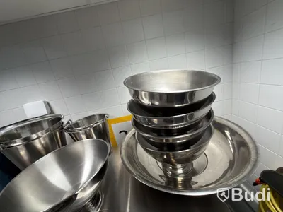 Lot of stainless steel ice buckets and a stainless steel bucket