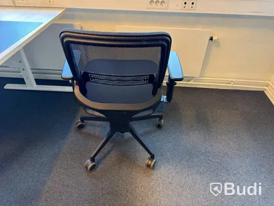 3 desks with chairs