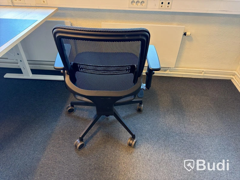 3 desks with chairs