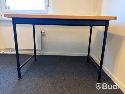 3 desks with chairs