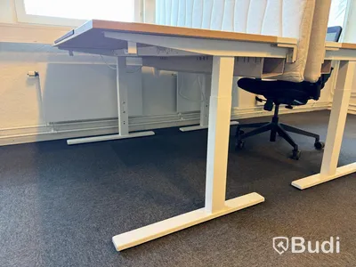3 desks with chairs