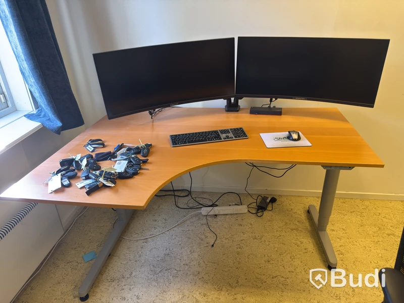 2 office workstations with dual monitors