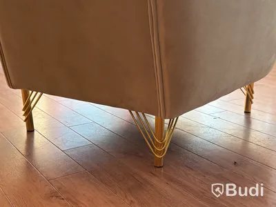 Fåtölj i beige sammet