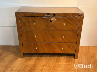 Byrå i bronstonat spegelglas