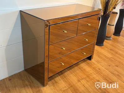 Byrå i bronstonat spegelglas
