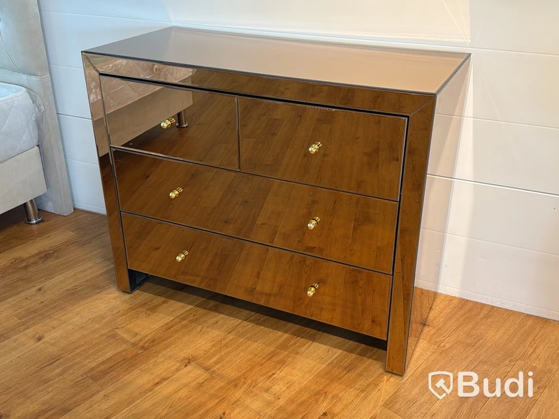 Byrå i bronstonat spegelglas