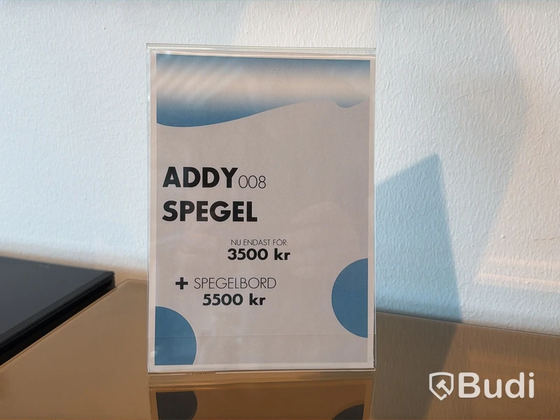 Avlastnings-/ spegelbord i bronstonat spegelglas