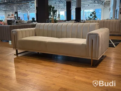 Soffa i beige sammet
