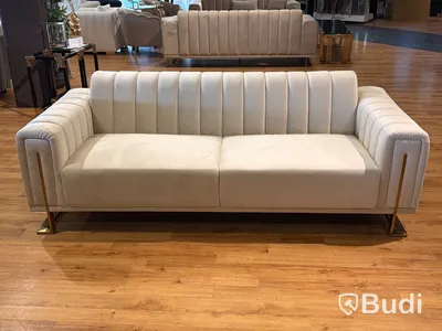 Soffa i beige sammet