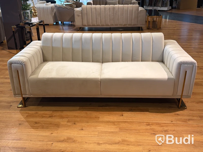 Soffa i beige sammet
