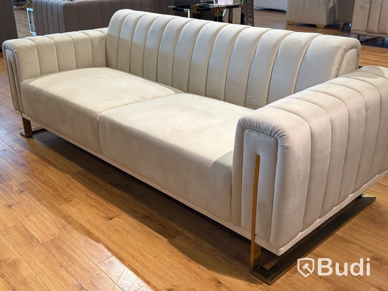 Soffa i beige sammet