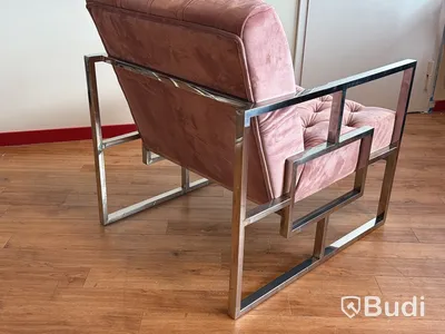 Fåtölj i rosa sammet
