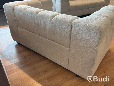 2-sits soffa i vitt teddytyg