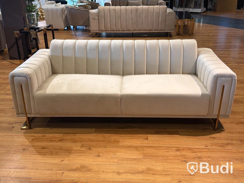 Soffa i beige sammet