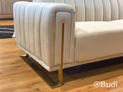 Soffa i beige sammet