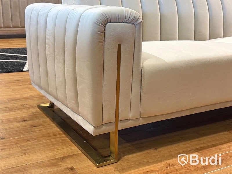 Soffa i beige sammet