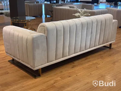 Soffa i beige sammet