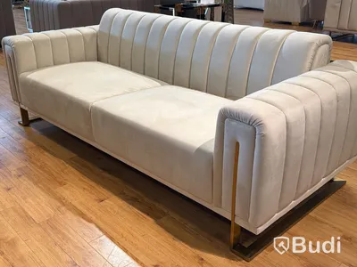 Soffa i beige sammet