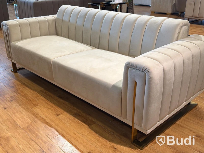 Soffa i beige sammet