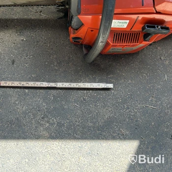 Husqvarna 3120XP chainsaw with long guide bar