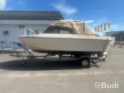 Motorboat Ryds 530DC with Johnson 70 hp 2-stroke. Length: 5.3 m. 1988