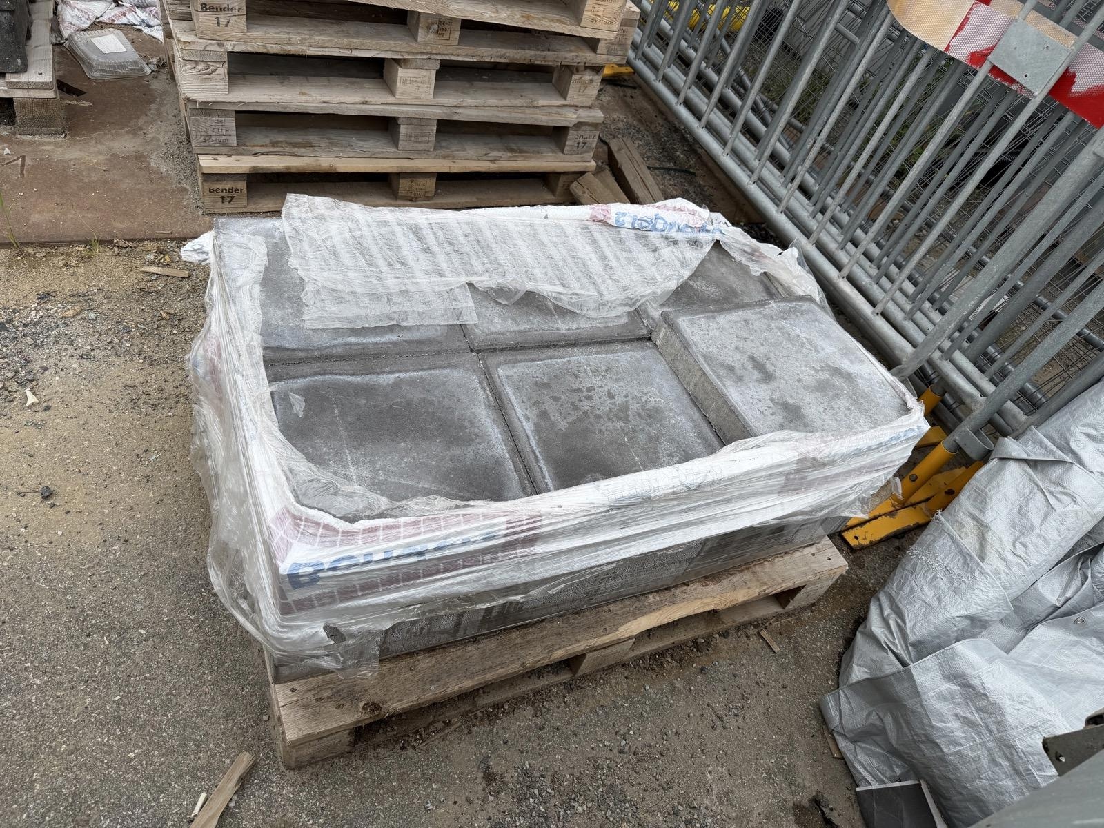 Concrete slabs 30 x 35 cm on a pallet