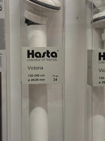 Lot of curtain rods in various styles and sizes